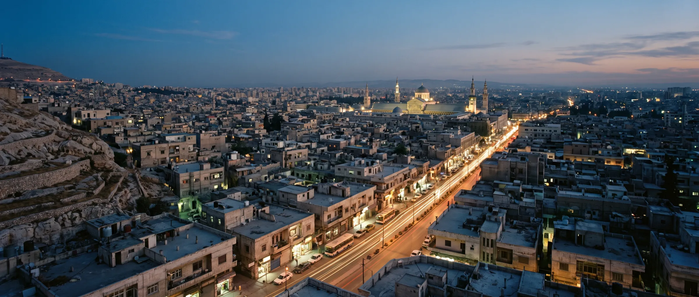 Damascus at dusk, seen from the slopes above the city